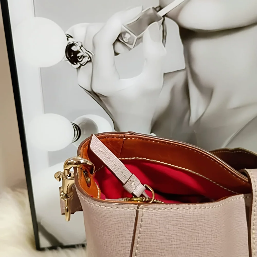 Dooney & Bourke Mauve Shoulder Bag with Gold Buckle